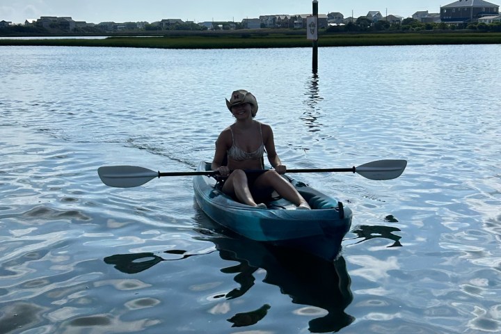 a small boat in a body of water