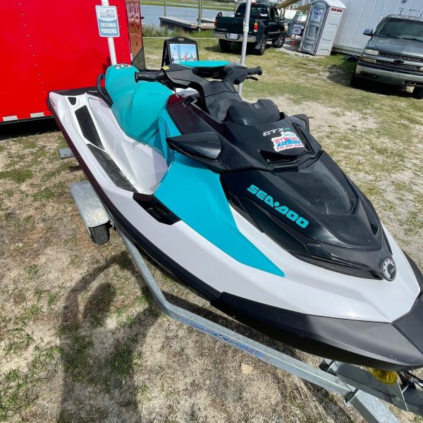 a motorcycle parked on the side of a boat