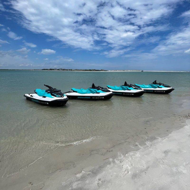 a group of people on a boat in a body of water